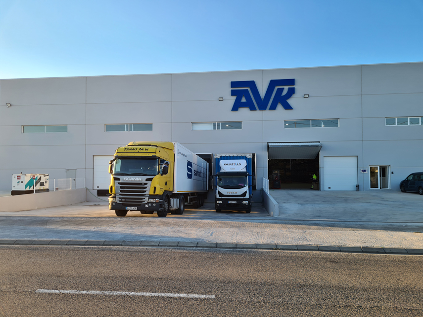 Trucks outside warehouse